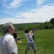 Father and son enjoying the day dusting clay pigeons
